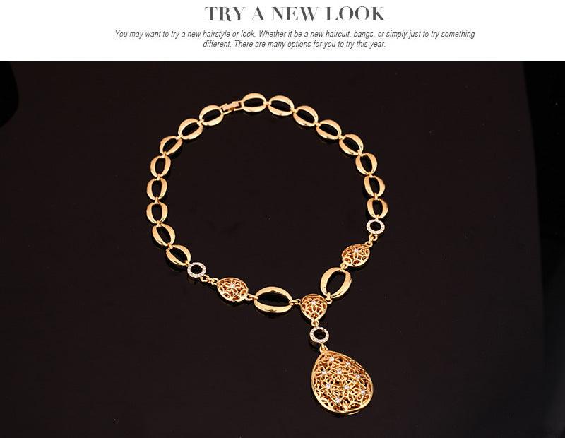 Jewelry Fashion Necklace with Bamboo Link Chain and Water Drop Pendant on Black Background.
