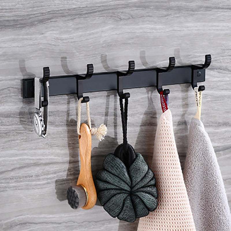 Punch free bathroom coat hooks in black with six hooks for organizing items.