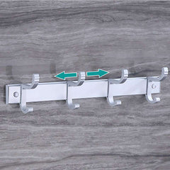 Punch free Bathroom coat hooks with four white hooks mounted on a gray tiled wall.
