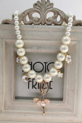 Korean pearl necklace for children in symphony white, featuring a ballet dancer pendant.