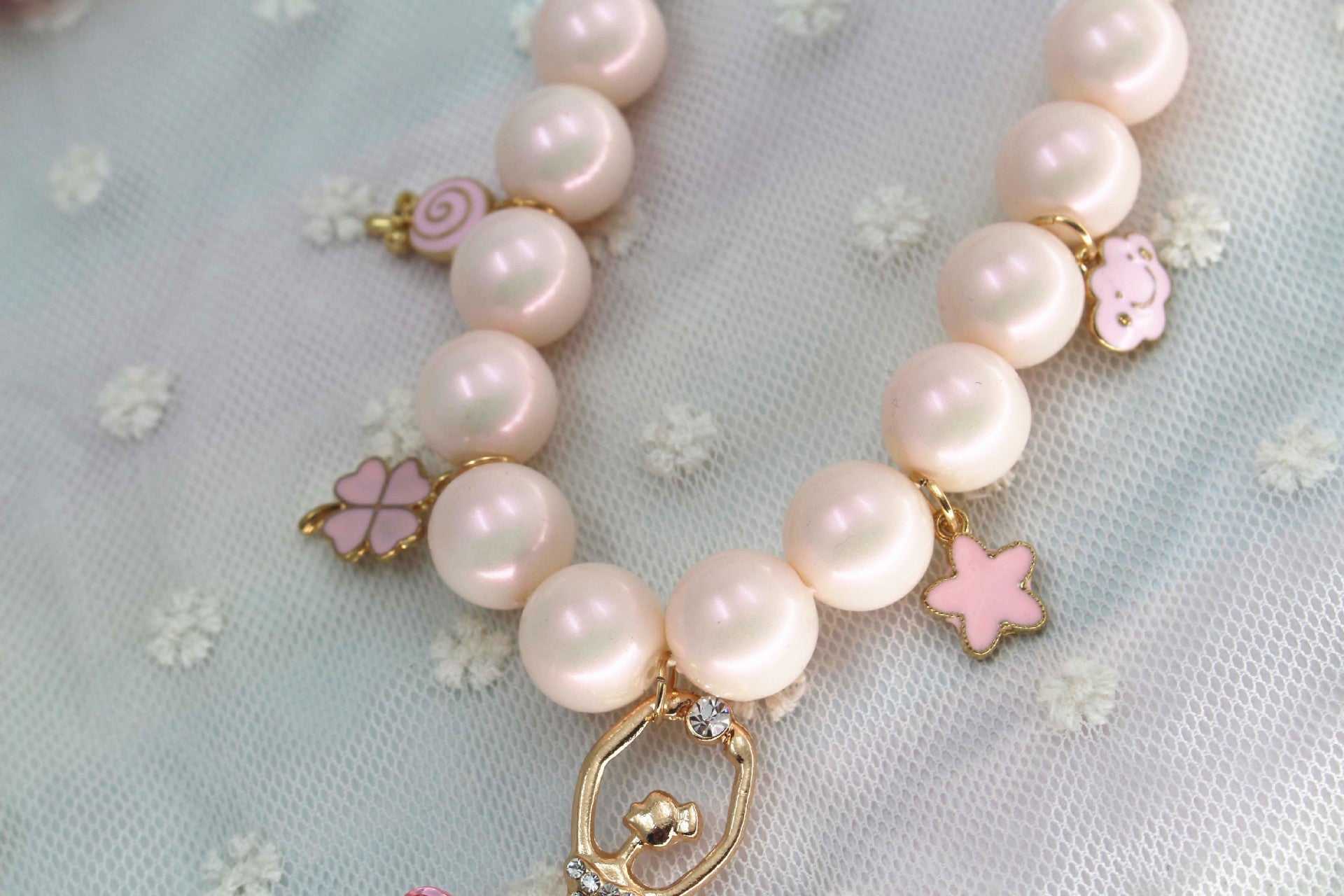 Pearl necklace with pink charms, Korean jewelry accessories style.
