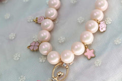 Pearl necklace with pink charms, Korean jewelry accessories style.