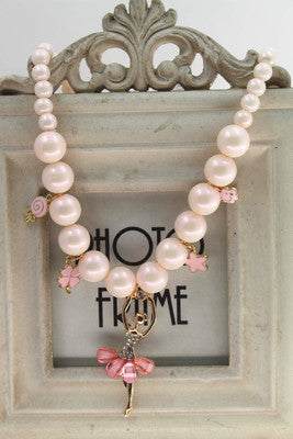 Korean Jewelry Accessories children's necklace with pink pearls and floral charms.