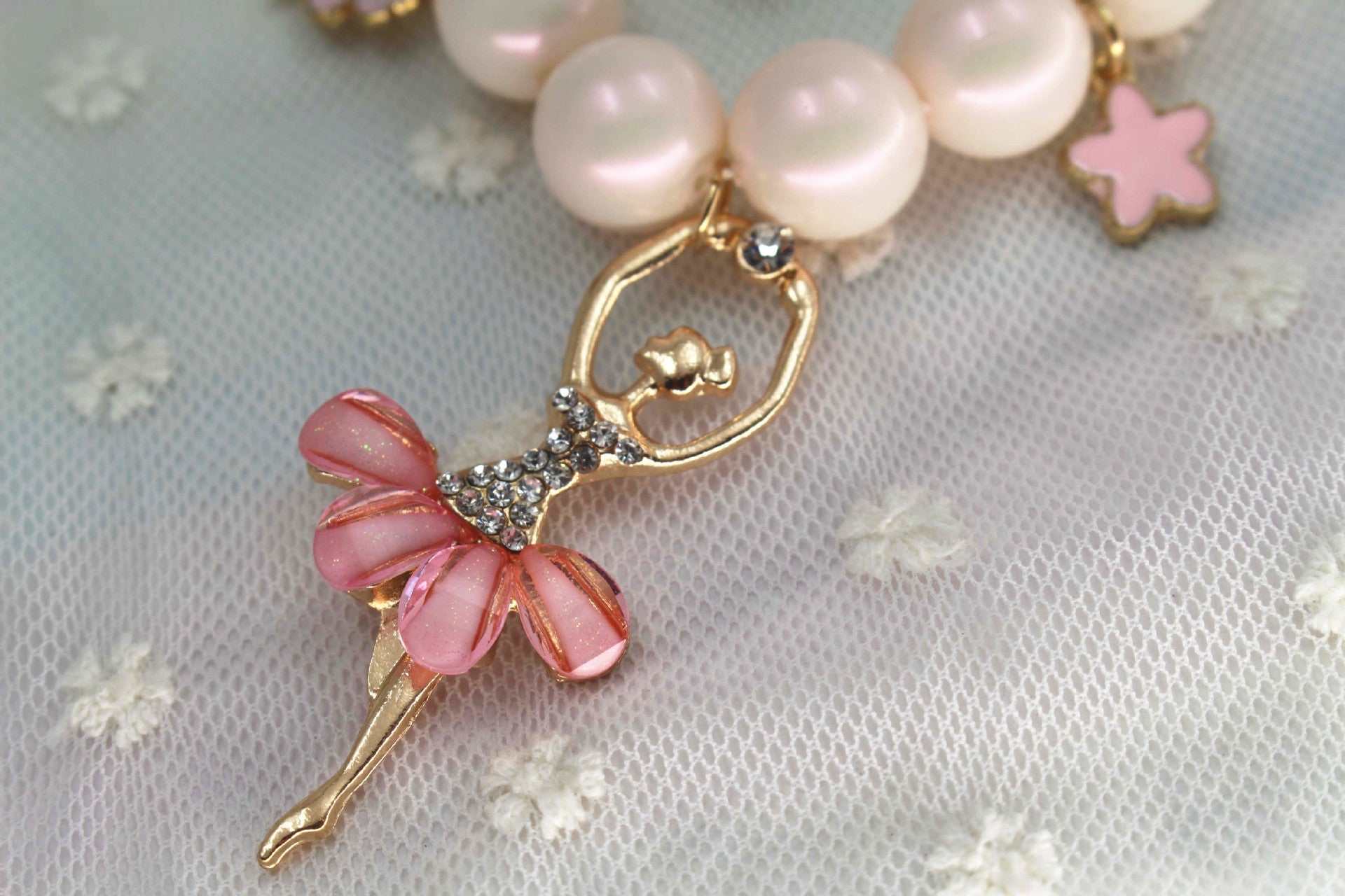 Korean Jewelry Accessories children's pearl necklace in symphony white and pink with ballerina charm.