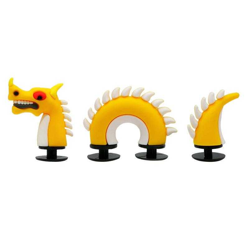 3D dragon shoe buckle accessories in yellow with multi-component design.