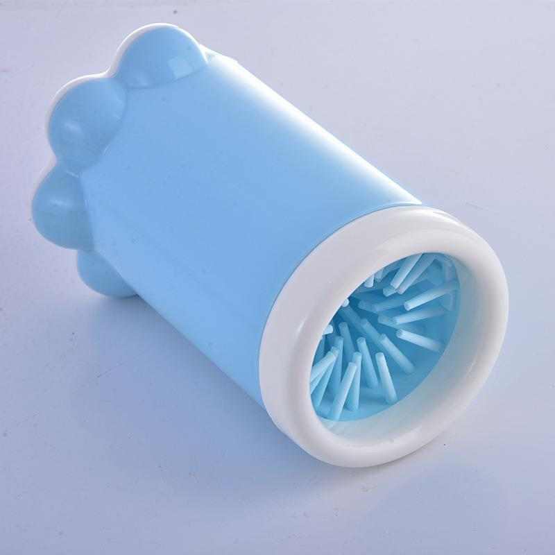 Blue silicone dog paw cleaning tool for small pets.