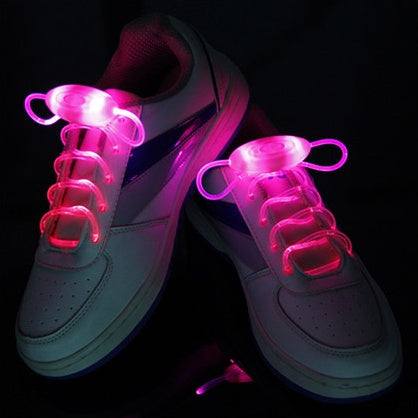 Led Sport Shoe Laces glowing pink on white sneakers, showcasing bright LED and fiber-optic light.