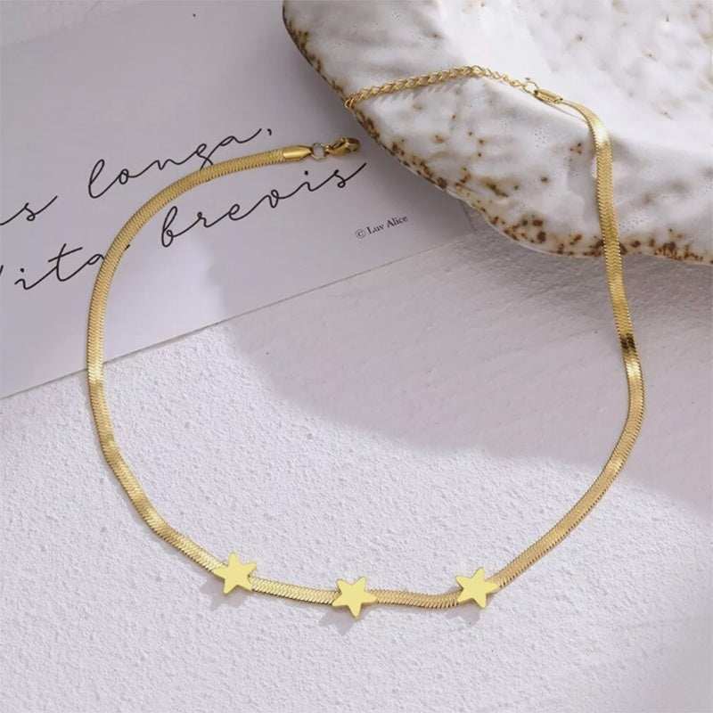 Gold stainless steel chain necklace with star-shaped titanium steel pendants.
