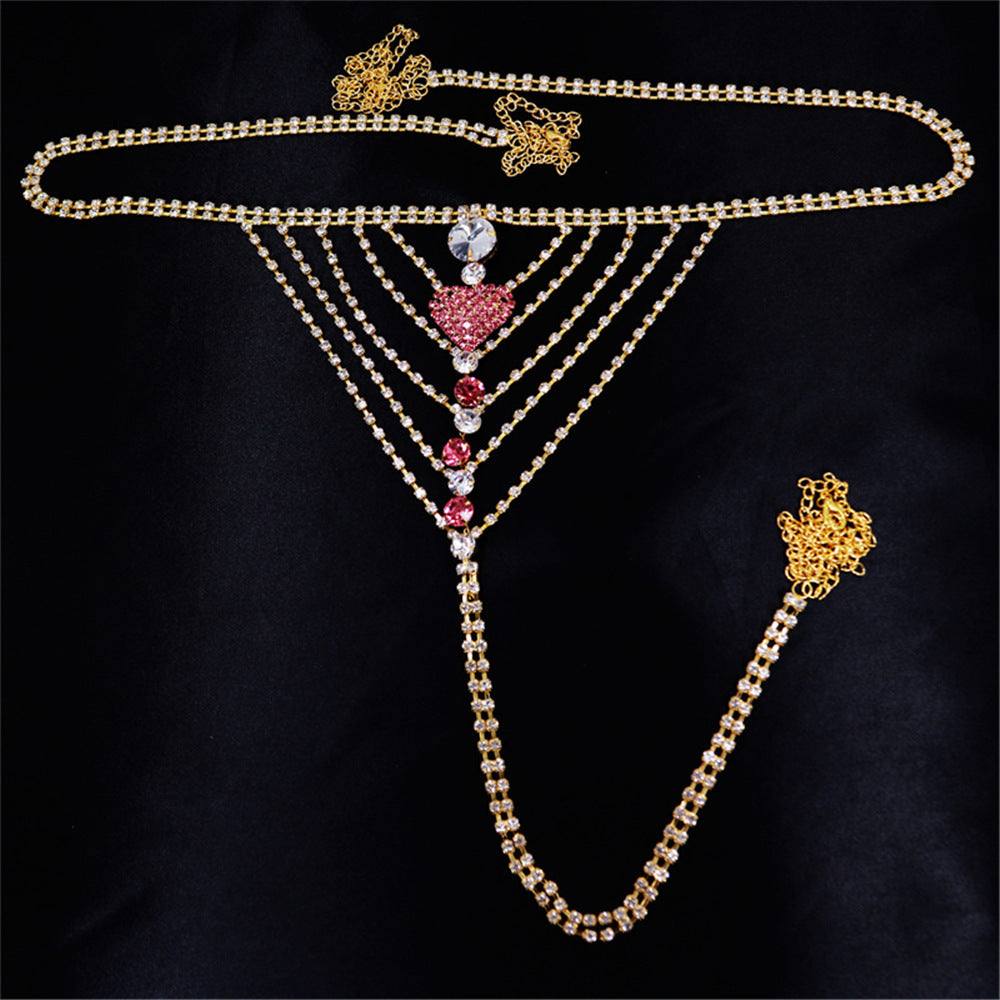 Heart Rhinestone Panty body jewelry with gold-plated rhinestones on black background.