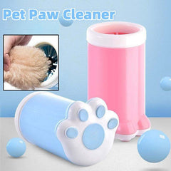 Portable pet paw cleaner in pink and blue silicone for small dogs and cats.