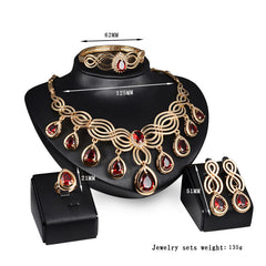 Jewelry Fashion Gems set with necklace, earrings, and bracelet in alloy and rhinestone, 18K gold color.