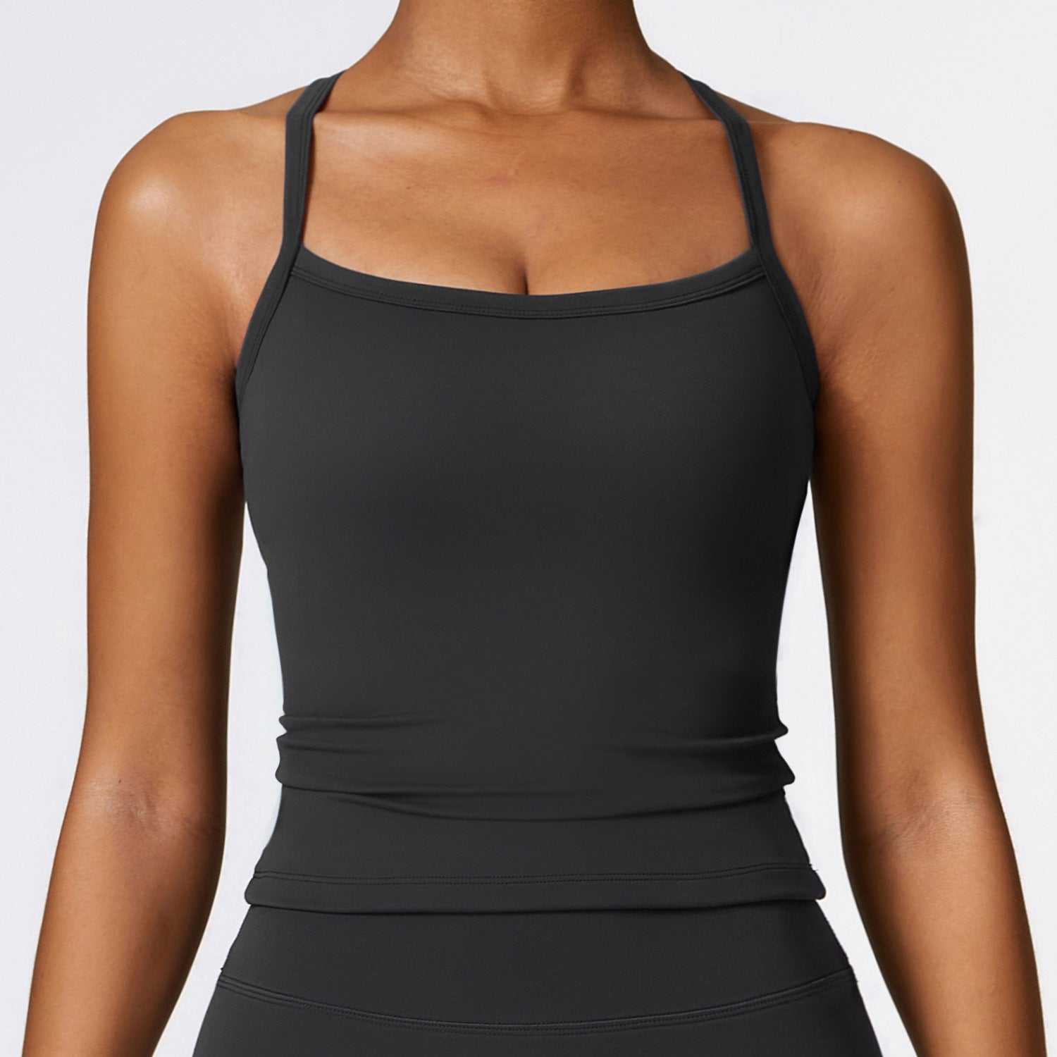 Women's beauty back yoga vest in premium black, sleeveless, quick-drying workout top.