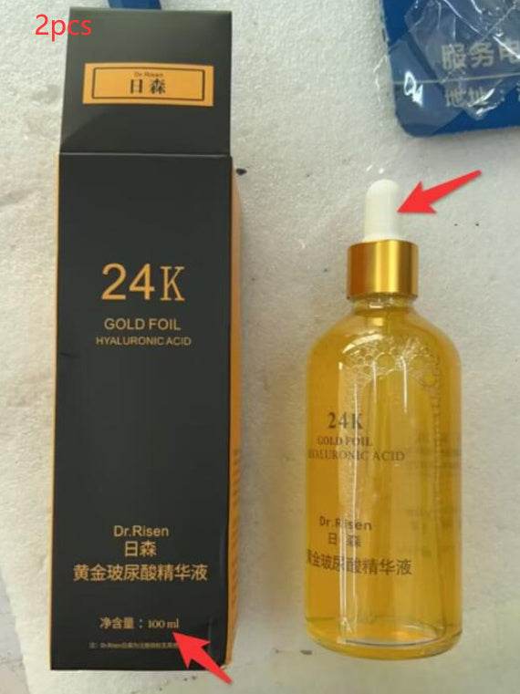 Firming and lifting skin care product with 24K gold foil and hyaluronic acid in 100ml bottle.