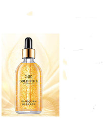 Firming and lifting skin care product with gold liquid and ginseng essence in 100ml bottle.