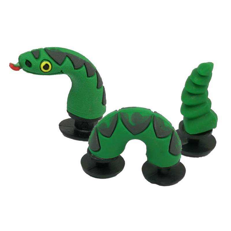 3D multi-component shoe accessories in dragon design.