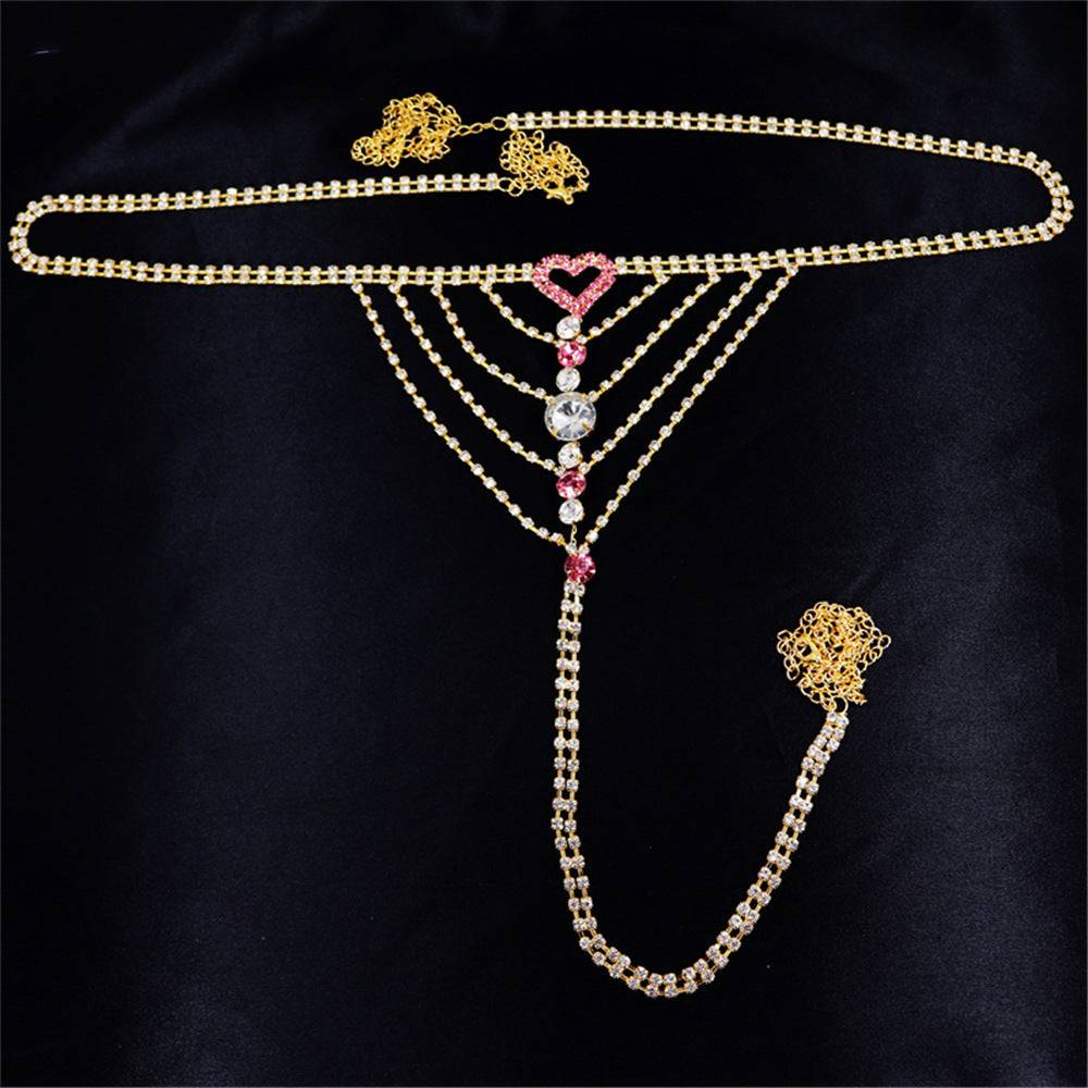 Heart Rhinestone Panty jewelry in gold with pink heart and rhinestone details.