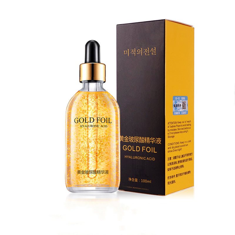Firming and lifting skin care product with gold liquid and ginseng essence, 100ml bottle.