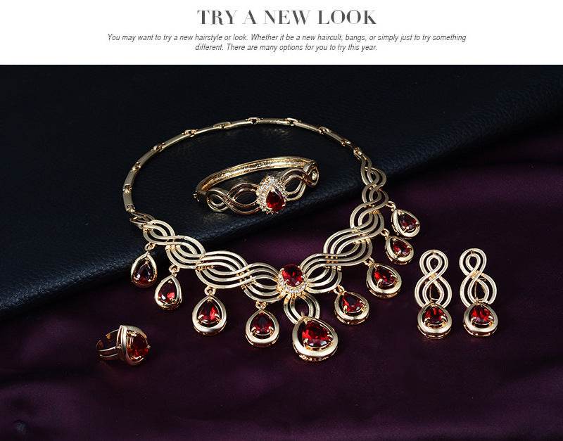 Jewelry Fashion Gems set with necklace, earrings, and ring in 18K gold alloy and rhinestone.